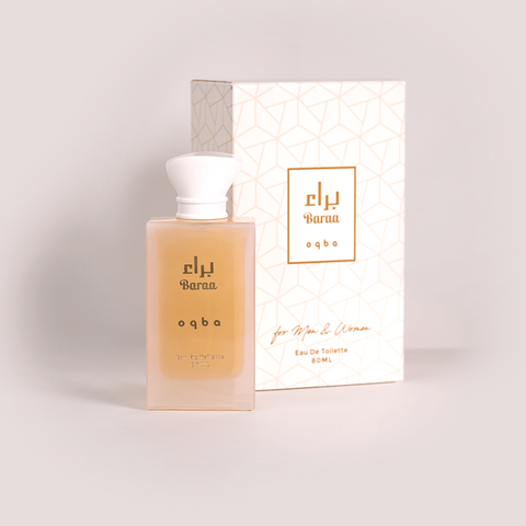 Perfume bottle and packaging with  branding on a light background